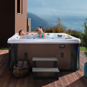 couple sitting in hot tub outdoors