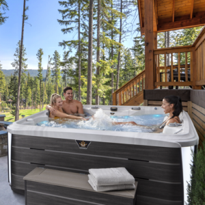 couple sitting in hot tub outdoors