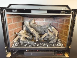 Travis 34 DVL gas insert with log set installed during a Collegeville, PA installation