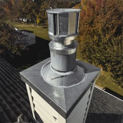 Chimney liner cap and custom metal chase cover installed for a gas insert in Collegeville, PA